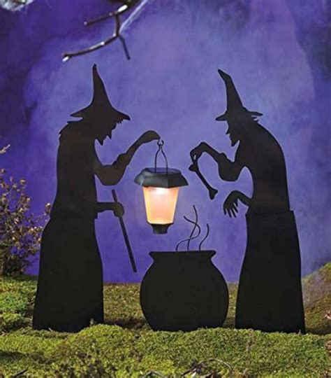 Halloween witch stakes sculpture